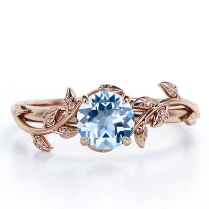 Sky Blue Topaz Leaf Solitaire in Rose Gold