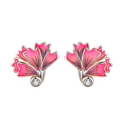 Carnation Stud EarringsThese stud earrings feature genuine Swarovski Zirconia for a timeless, elegant look. Each Carnation Petal is crafted with a brilliant luster and precision cut to shoStud EarringsIN STOCKDhia JewelleryCarnation Stud Earrings